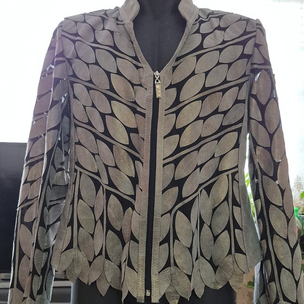 Unique leather on sheer woman jacket.